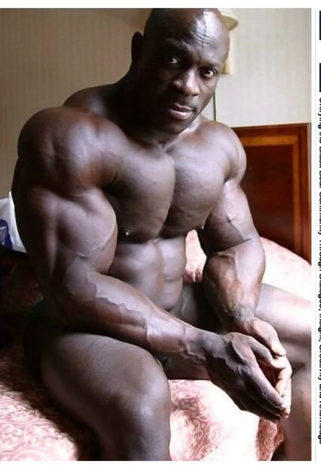 Huge Black Man on Bed